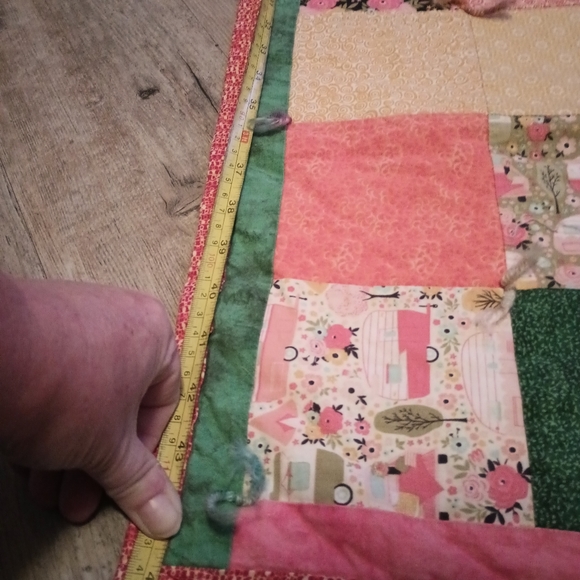 Beautiful pink backing quilt with yarn ties. - Picture 12 of 16